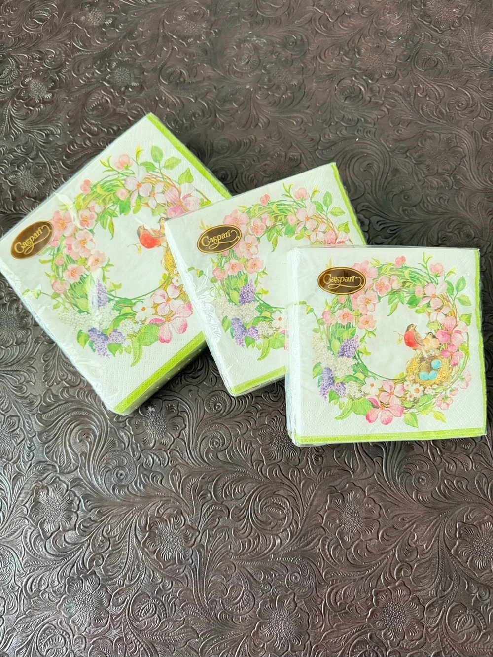 Three packages of Caspari napkins. 1 lunch 2 cocktail Floral Bird Paper Napkins